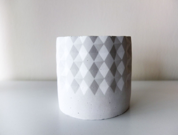 white planter with geometric design