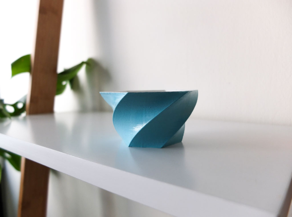 3d-printed planter painted in light blue